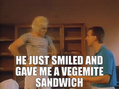 A Man And A Woman Standing Next To Each Other With The Caption He Just Smiled And Gave Me A Vegemite Sandwich .. GIF