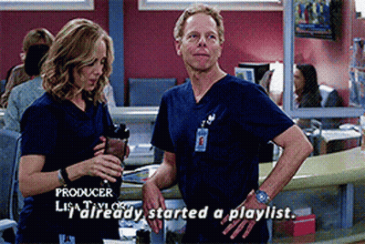A Man And A Woman Standing Next To Each Other With The Words Producer Lisa Taylor Already Started A Playlist Below Them GIF