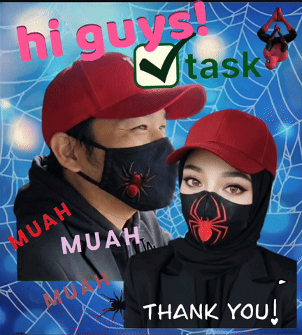 A Man And A Woman Wearing Face Masks With Spiders On Them GIF