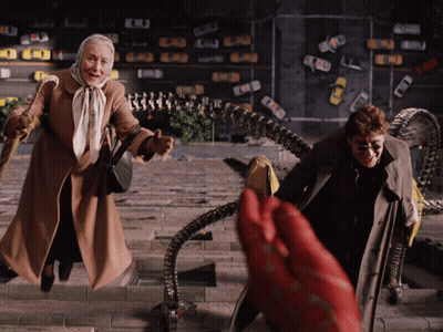 A Man And An Elderly Woman Are Walking Down A Set Of Stairs GIF