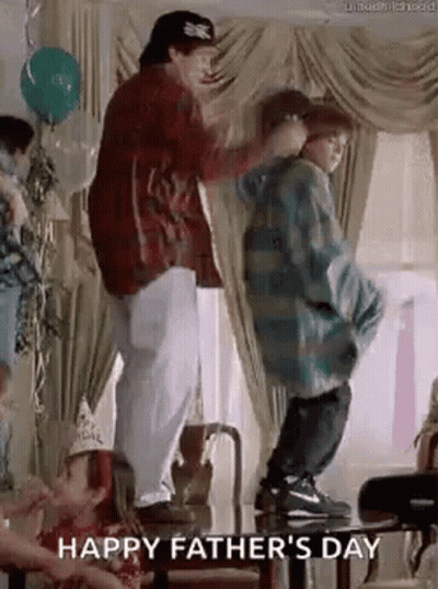 A Man And Two Children Are Dancing At A Father 'S Day Party In A Living Room . GIF