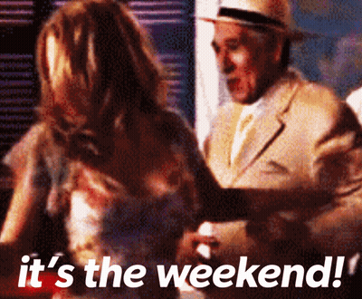 A Man And Woman Are Dancing And The Words It 'S The Weekend GIF
