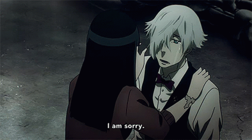 A Man And Woman Are Hugging And The Man Is Saying I Am Sorry GIF
