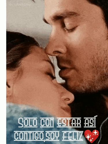 A Man And Woman Are Kissing With The Words Solo Con Estar Asi Contigo Soy Feliz GIF
