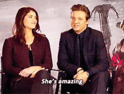 A Man And Woman Are Sitting Next To Each Other And The Woman Says She 'S Amazing GIF