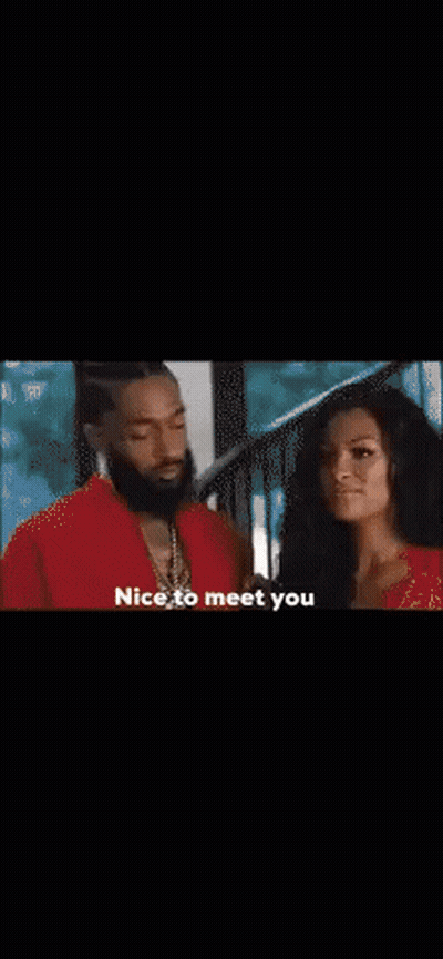 A Man And Woman Are Standing Next To Each Other And The Man Is Saying Nice To Meet You GIF