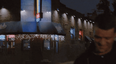 A Man And Woman Are Walking Down A Street And The Man Says I 'M Sorry To Take You Away GIF