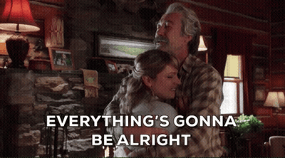 A Man And Woman Hugging In A Living Room With The Words Everything 'S Gonna Be Alright Below Them GIF