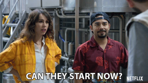 Man And Woman Standing With Can They Start Now GIF