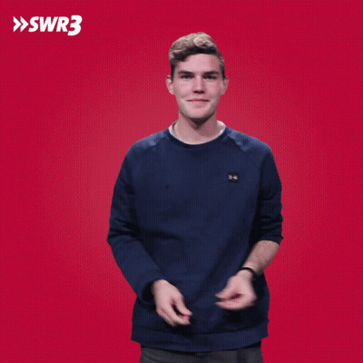 A Man Applauds In Front Of A Red Background That Says Swr3 On It GIF