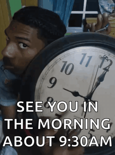 A Man Behind A Clock That Says " See You In The Morning About 9:30Am " GIF