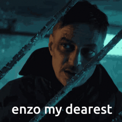 A Man Behind Bars With The Words Enzo My Dearest Written Below Him GIF
