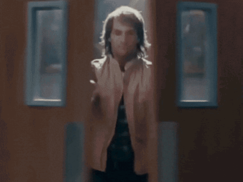 A Man Blowing A Fugum Gum Bubble In His Mouth GIF