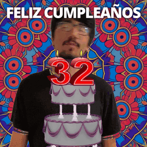 A Man Blowing Out Candles On A Cake That Says 32 GIF