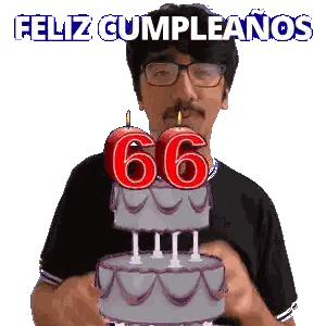 A Man Blows Out A Candle On A Cake With The Number 66 On It Sticker