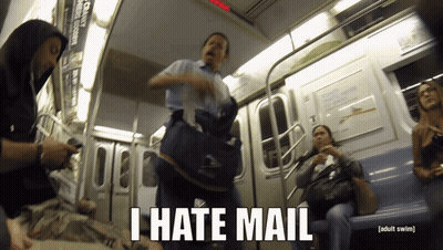A Man Carrying A Bag On A Subway Train Says " I Hate Mail " GIF
