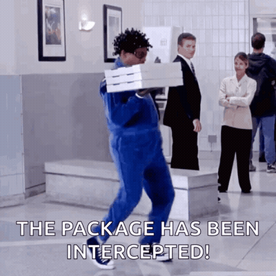 A Man Carrying A Box Of Pizza With The Words The Package Has Been Intercepted GIF