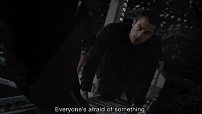 A Man Climbs A Set Of Stairs And Says Everyone 'S Afraid Of Something . GIF