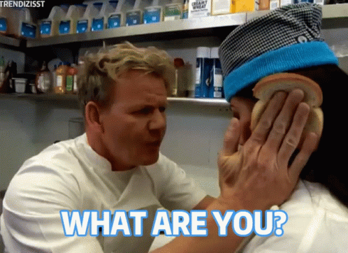 A Man Covering A Woman 'S Ear With A Sandwich And The Words " What Are You " Below Him GIF