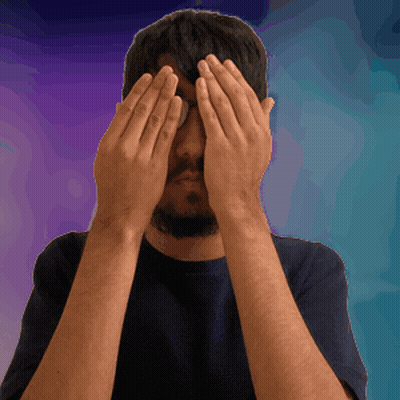 A Man Covering His Face With His Hands With A Purple Background GIF