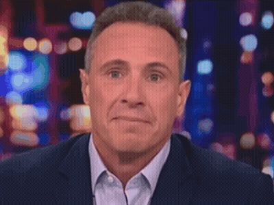 A Man Covering His Mouth With His Hands With A Ring On His Finger GIF