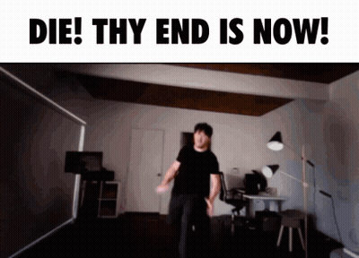 A Man Dancing In A Room With The Words Die Thy End Is Now GIF