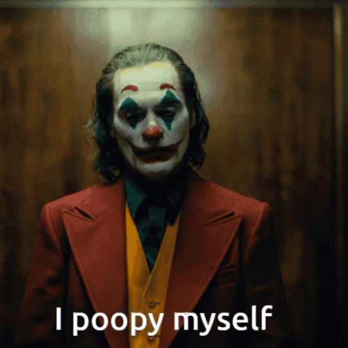 A Man Dressed As A Clown With The Words I Poopy Myself Below Him GIF