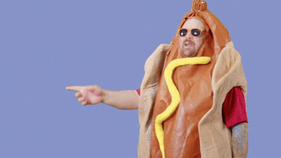 A Man Dressed As A Hot Dog With The Words You Know It Above Him GIF