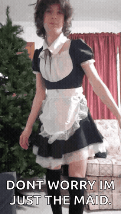 A Man Dressed As A Maid With The Words " Dont Worry Im Just The Maid " GIF