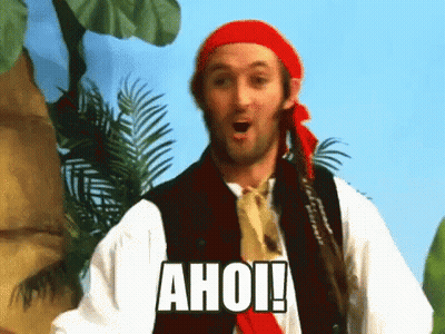 A Man Dressed As A Pirate With The Word Ahoi On His Chest GIF