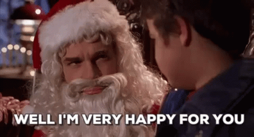 A Man Dressed As Santa Claus Is Talking To A Young Boy And Says `` Well I 'M Very Happy For You '' . GIF