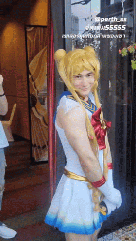 A Man Dressed In A Sailor Moon Costume GIF