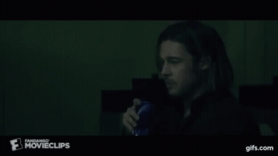 A Man Drinking From A Blue Cup With A Fandango Movie Clips Logo On The Bottom GIF