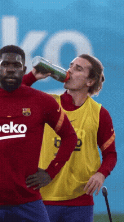 A Man Drinking From A Bottle With The Word Beko On His Shirt GIF