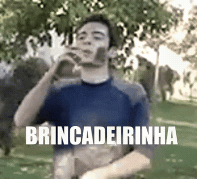 A Man Drinking From A Bottle With The Word Brincadeirainha Written Below Him GIF