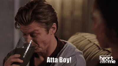A Man Drinking From A Glass With The Words Atta Boy Written Below Him GIF