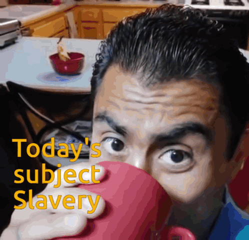 A Man Drinking From A Red Cup With The Words Today 'S Subject Slavery Written Above Him GIF