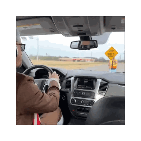 A Man Driving A Car Next To A Yellow Sign That Says Call Outy Way Sticker