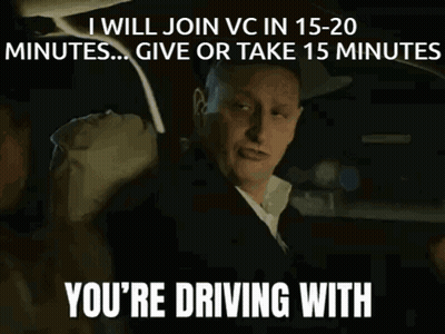 A Man Driving A Car With The Words " I Will Join Vc In 15-20 Minutes ... Give Or Take 15 Minutes " GIF