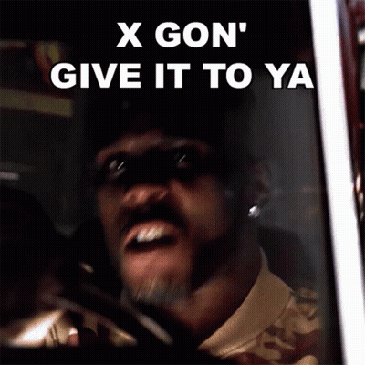 A Man Driving A Car With The Words " X Gon ' Give It To Ya " On The Screen GIF