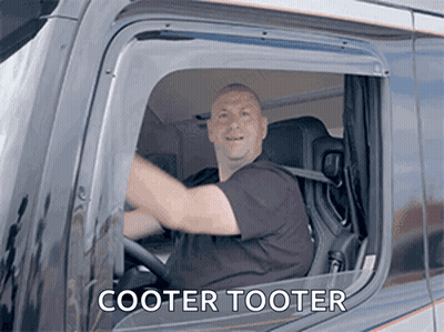 A Man Driving A Truck With The Words Cooter Tooter Written On The Side GIF