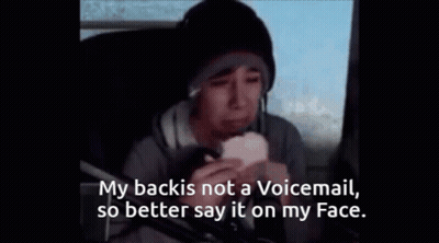A Man Eating A Sandwich With The Words " My Back Is Not A Voicemail So Better Say It On My Face " GIF