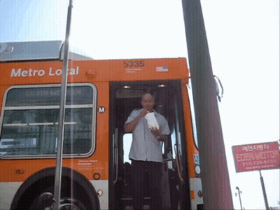 A Man Getting Off A Metro Local Bus With 5335 On The Side GIF