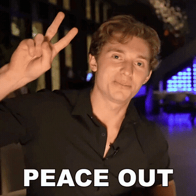A Man Giving A Peace Sign With The Words Peace Out Behind Him GIF