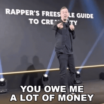 A Man Giving A Speech With The Words You Owe Me A Lot Of Money GIF
