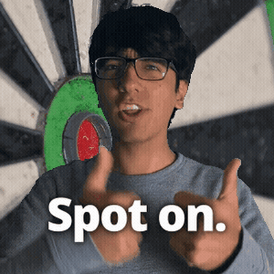 A Man Giving A Thumbs Up In Front Of A Dart Board With The Words Spot On GIF