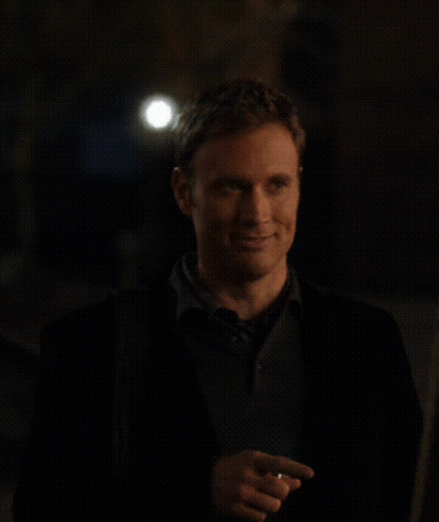 A Man Giving A Thumbs Up In Front Of A Sign That Says " I Like It " GIF