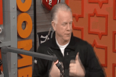 A Man Giving A Thumbs Up In Front Of A Sign That Says ' One ' GIF