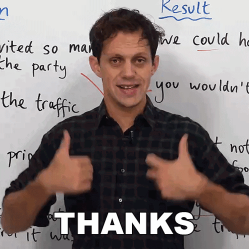 A Man Giving A Thumbs Up In Front Of A White Board With The Word Thanks Written On It GIF