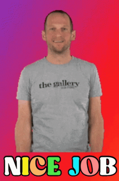 A Man Giving A Thumbs Up Wearing A Shirt That Says The Gallery GIF